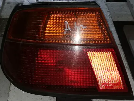Левый фонарь на Nissan Almera за 6 000 тг. в Алматы