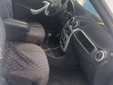 Renault Logan 2013 года за 2 400 000 тг. в Аксай – фото 5
