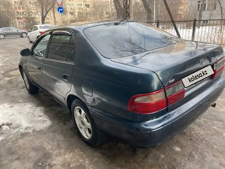 Toyota Carina E 1997 года за 1 800 000 тг. в Алматы – фото 6