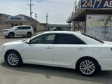 Toyota Camry 2014 года за 11 500 000 тг. в Атырау – фото 4