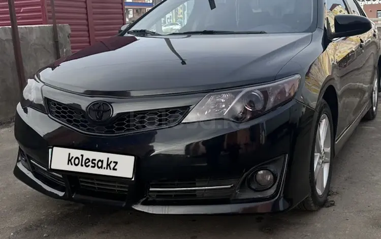 Toyota Camry 2014 года за 8 200 000 тг. в Атырау