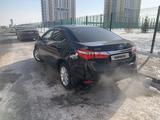 Toyota Corolla 2013 года за 7 290 000 тг. в Астана – фото 4