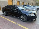 Toyota Camry 2014 года за 7 800 000 тг. в Астана – фото 2