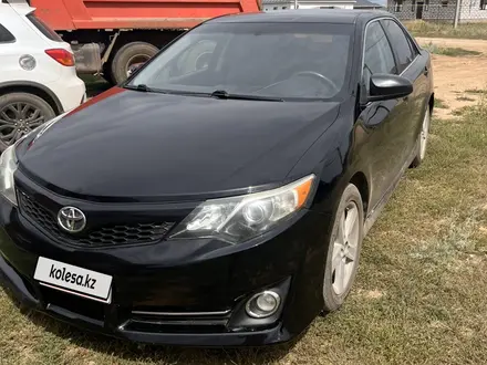 Toyota Camry 2014 года за 6 200 000 тг. в Актобе