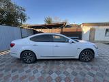 Kia K7 2010 года за 3 200 000 тг. в Атырау – фото 2