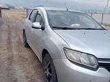 Renault Logan 2015 года за 2 700 000 тг. в Атырау – фото 4