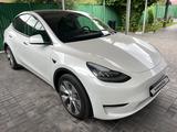 Tesla Model Y 2021 года за 22 660 000 тг. в Алматы – фото 2