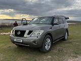 Nissan Patrol 2012 года за 8 750 000 тг. в Астана – фото 2