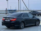 Toyota Camry 2013 года за 8 500 000 тг. в Жанаозен – фото 4