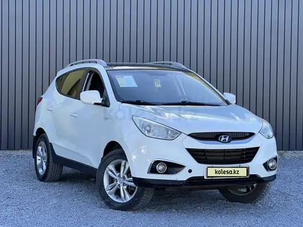 Hyundai Tucson 2010 года за 6 990 000 тг. в Актобе – фото 2