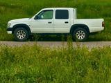 Toyota Hilux 2004 года за 2 399 000 тг. в Алматы – фото 4