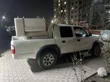 Toyota Hilux 2004 года за 2 399 000 тг. в Алматы – фото 2