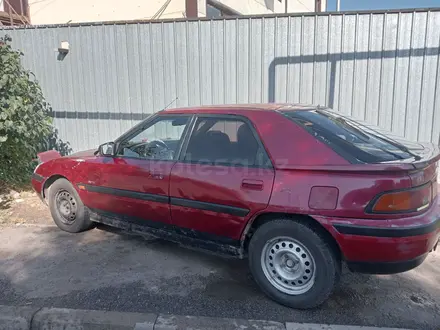 Mazda 323 1993 года за 570 000 тг. в Алматы – фото 13