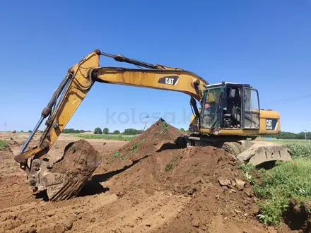 Caterpillar  318 2014 года за 31 400 000 тг. в Алматы