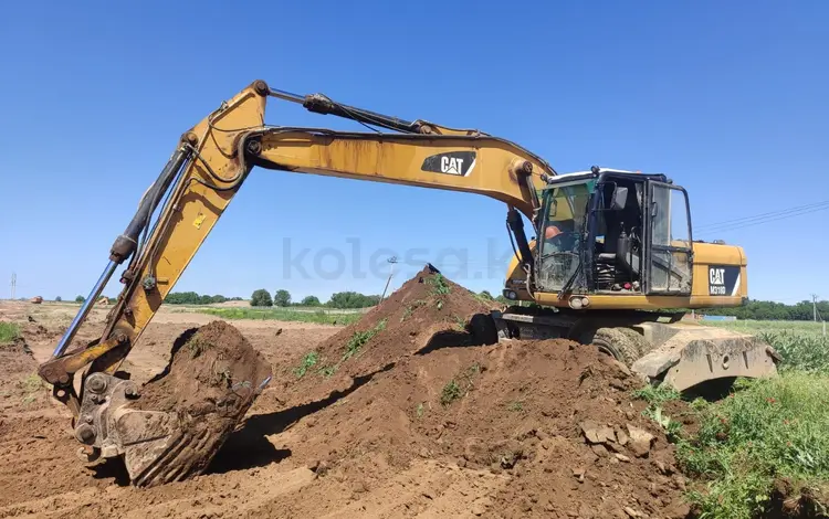 Caterpillar  318 2014 года за 31 400 000 тг. в Алматы