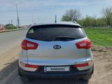 Kia Sportage 2012 года за 7 500 000 тг. в Актобе – фото 2