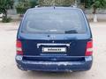 Kia Carnival 2001 годаүшін1 300 000 тг. в Байконыр – фото 4