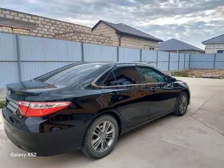 Toyota Camry 2015 года за 6 000 000 тг. в Кульсары – фото 9