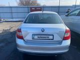 Skoda Rapid 2013 годаүшін1 242 500 тг. в Алматы – фото 2
