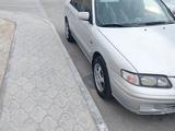 Mazda 626 1998 года за 2 100 000 тг. в Актау – фото 3