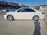 Toyota Camry 2010 года за 7 200 000 тг. в Жанаозен – фото 5