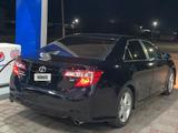 Toyota Camry 2013 годаfor8 200 000 тг. в Шымкент