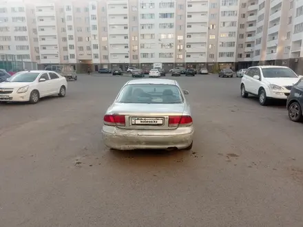 Mazda 626 1994 года за 850 000 тг. в Астана – фото 4