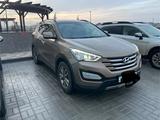 Hyundai Santa Fe 2013 года за 9 500 000 тг. в Атырау