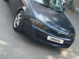 Mazda 323 1998 годаүшін1 350 000 тг. в Алматы – фото 3