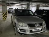 Volkswagen Touareg 2007 года за 7 243 379 тг. в Астана – фото 5