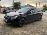 Chevrolet Cruze 2011 года за 2 650 000 тг. в Актобе – фото 2