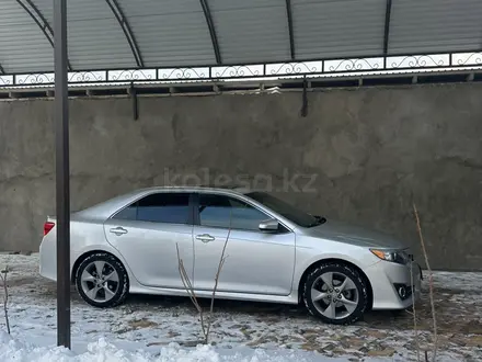 Toyota Camry 2013 года за 7 000 000 тг. в Жанаозен