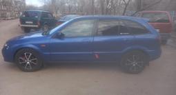 Mazda 323 2001 года за 2 250 000 тг. в Кокшетау – фото 2