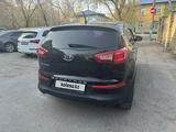 Kia Sportage 2011 года за 8 200 000 тг. в Караганда – фото 4