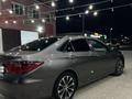 Toyota Camry 2015 года за 10 000 000 тг. в Жанаозен – фото 2