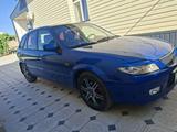 Mazda 323 2003 года за 2 500 000 тг. в Шымкент – фото 3