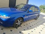 Mazda 323 2003 года за 2 500 000 тг. в Шымкент – фото 4