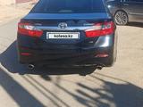 Toyota Camry 2013 года за 9 500 000 тг. в Айтеке би – фото 2