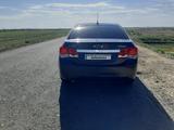 Chevrolet Cruze 2012 года за 2 900 000 тг. в Ганюшкино – фото 2