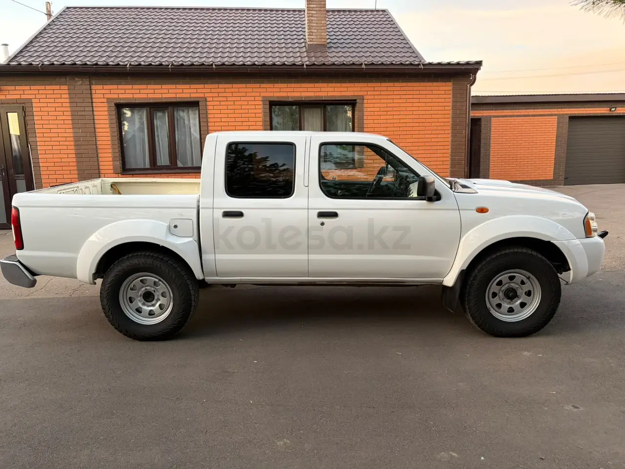 Ниссан NP300, 2012