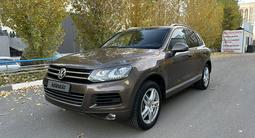 Volkswagen Touareg 2012 года за 11 000 000 тг. в Астана – фото 2