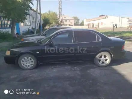 Kia Magentis 2003 года за 1 700 000 тг. в Астана – фото 8