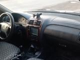 Mazda 626 1998 года за 1 800 000 тг. в Отеген-Батыр – фото 4