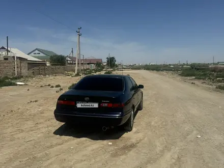 Toyota Camry 1998 года за 3 500 000 тг. в Жанаозен – фото 4