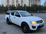 Mitsubishi L200 2012 года за 6 490 000 тг. в Астана – фото 4