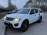 Mitsubishi L200 2012 года за 6 490 000 тг. в Астана