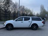Mitsubishi L200 2012 года за 6 490 000 тг. в Астана – фото 2