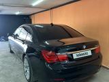 BMW 750 2010 года за 8 990 000 тг. в Астана – фото 2