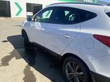 Hyundai Tucson 2014 годаүшін9 500 000 тг. в Актобе – фото 3