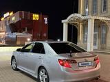 Toyota Camry 2014 годаүшін4 400 000 тг. в Уральск – фото 2